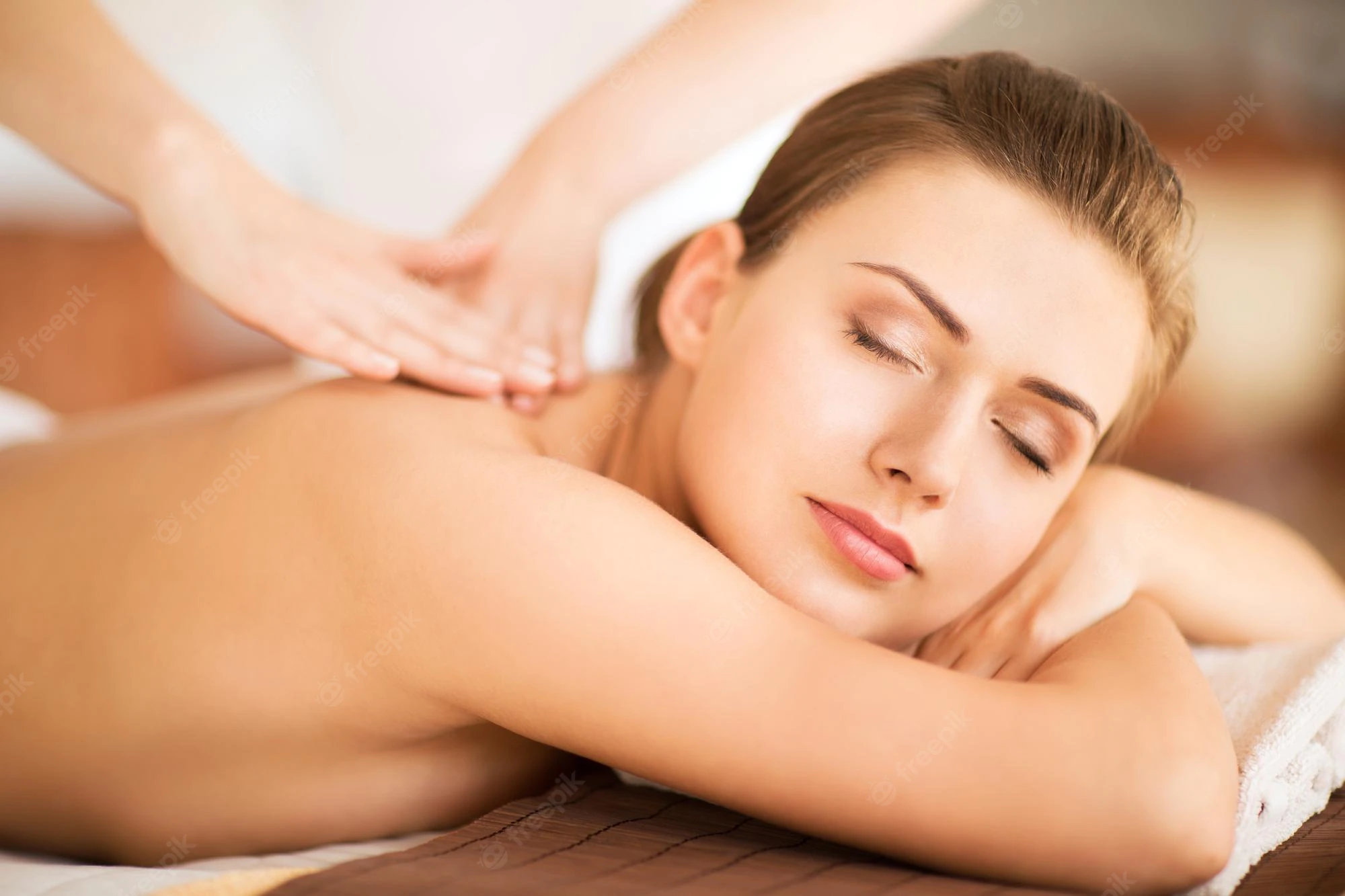 beauty-spa-concept-beautiful-woman-spa-salon-getting-massage_380164-37529